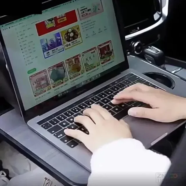 laptop placed on top of multi-Functional car Steering Desk tray